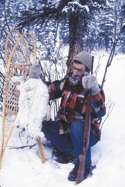 Tom Williams with snowshoe hares